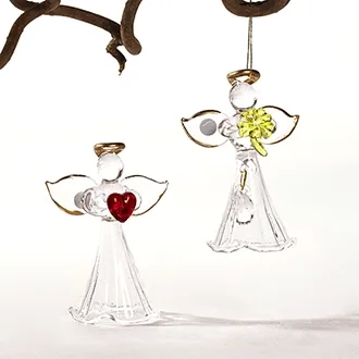 Glassengel 2 pk 6 cm. Den ene med hjerte i hånden og den andre med firkløver. Høyde 6cm. Les mer i nettbutikken www.engleshop.no